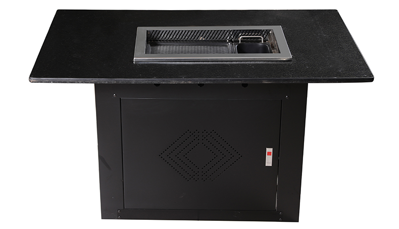 JHD‑630 smokeless bbq hotpot stove installed on black stone dining table, front view for korean hot pot barbecue restaurant furniture