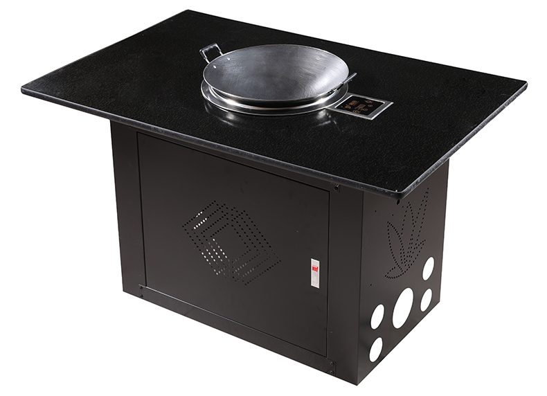 JHD‑420E commercial concave ceramic cooker table fitted with large iron wok pan for hotel kitchen